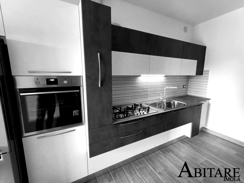 interior design cucina moderna piano hpl antracite bianco effetto resina arredare casa bologna medicina budrio castenaso oikos cucine