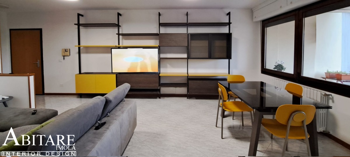interior design mobile soggiorno giallo parete attrezzata arredamento imola faenza bologna moretti compact
