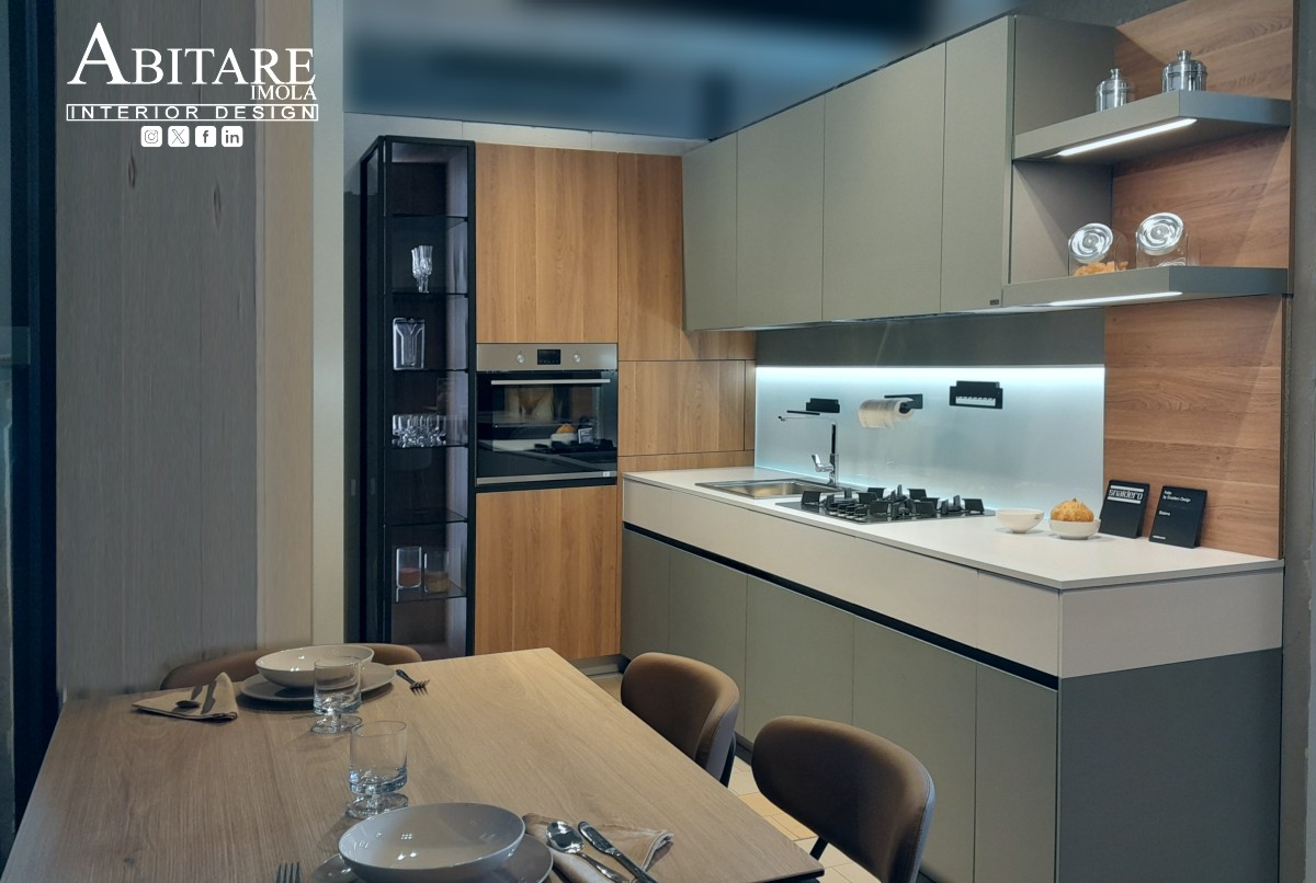 cucina folio abitare imola arredamento snaidero gola nera piano cottura gas cappa integrata verde salvia